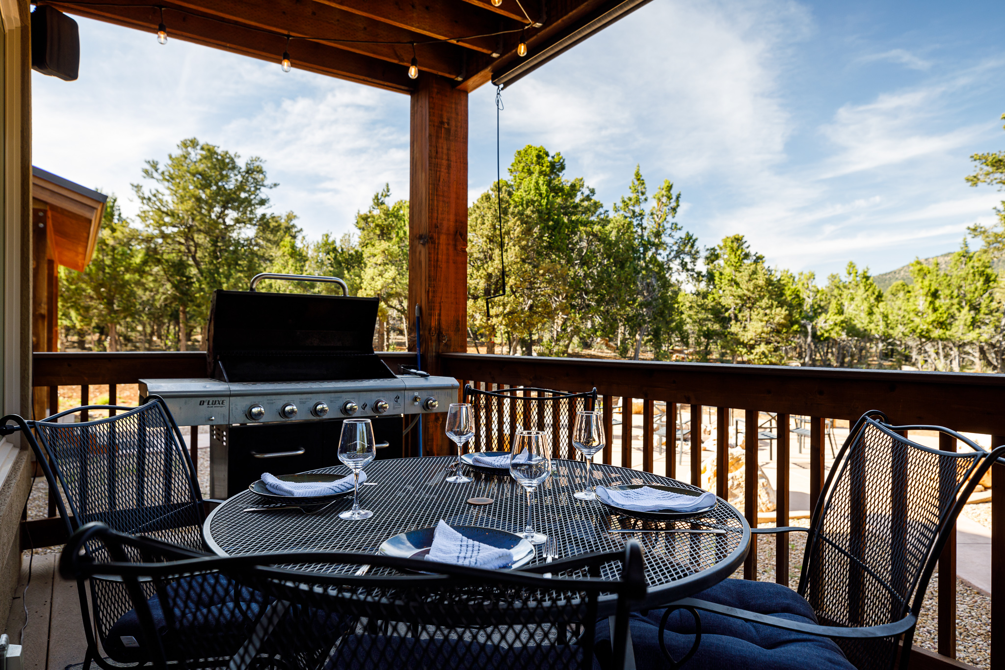 Back patio with grill and dining area