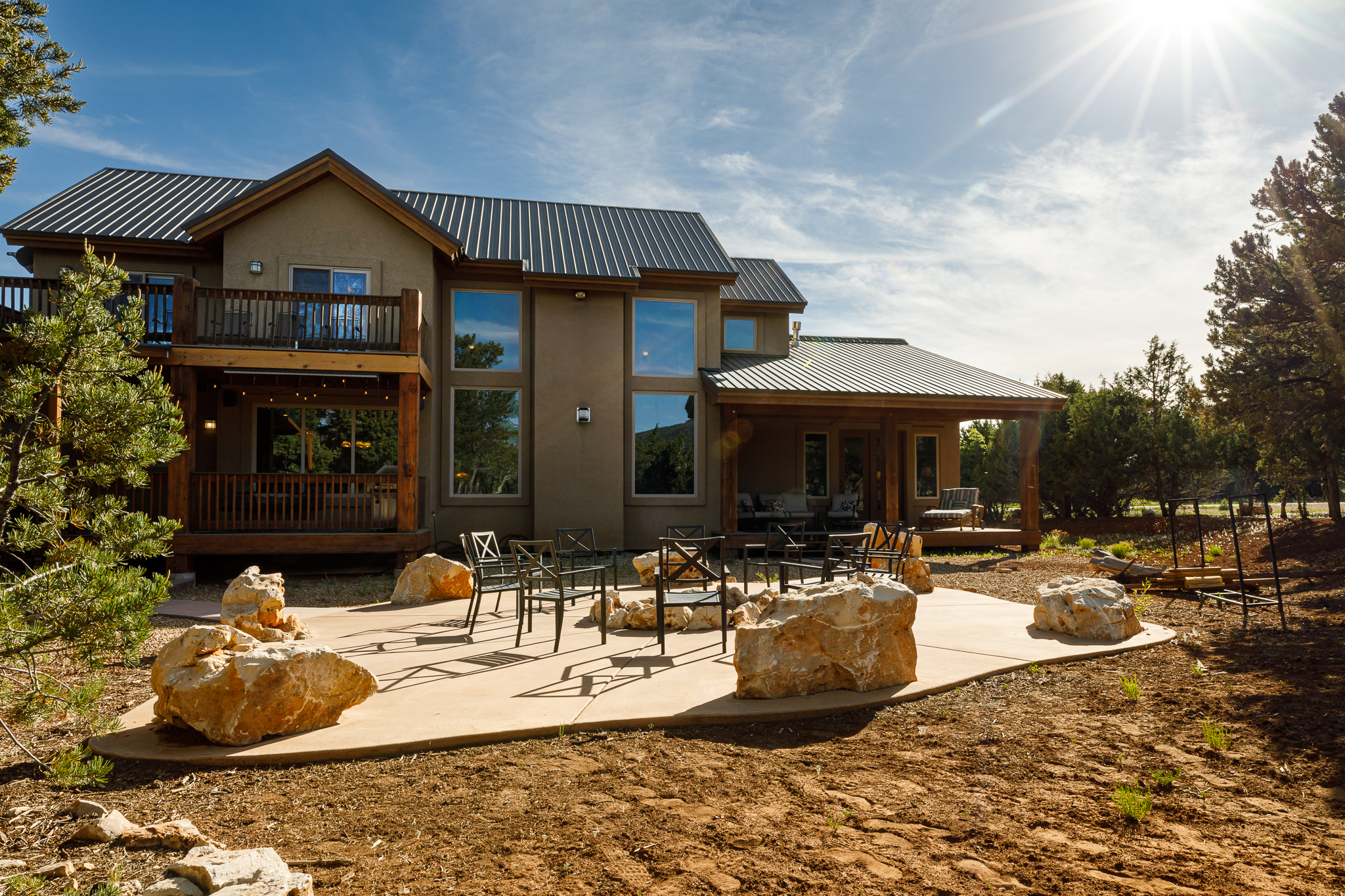 Backyard fire pit facing house
