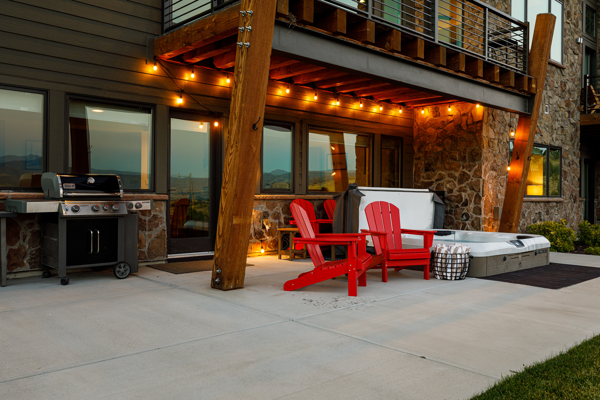 Backyard with grill and hot tub
