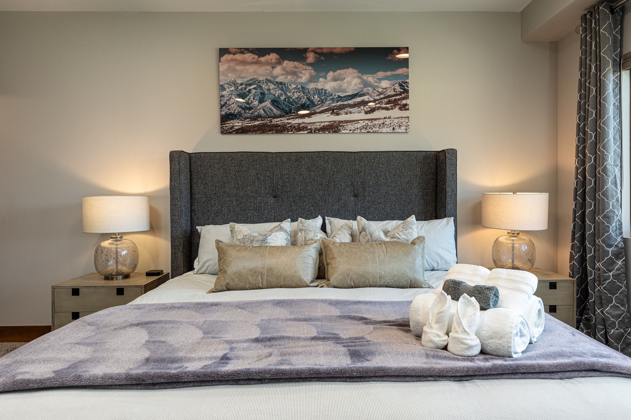 Master bedroom downstairs with king size bed