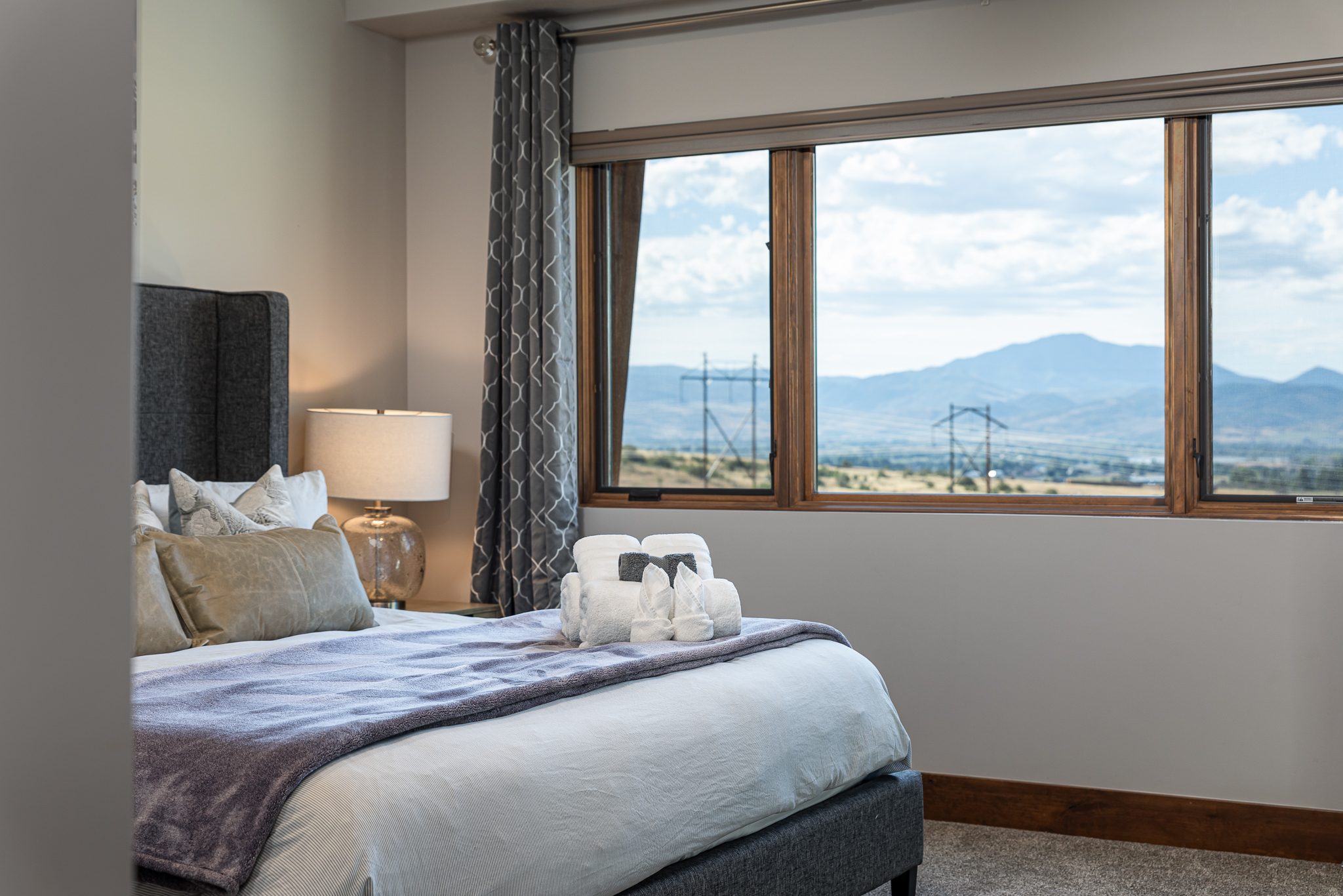 Master bedroom downstairs with king size bed