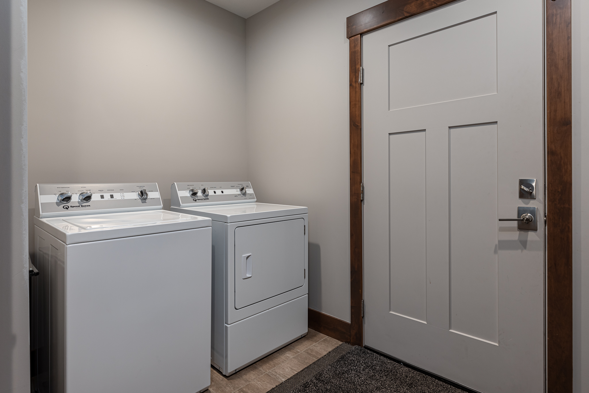 Laundry upstairs by the garage door