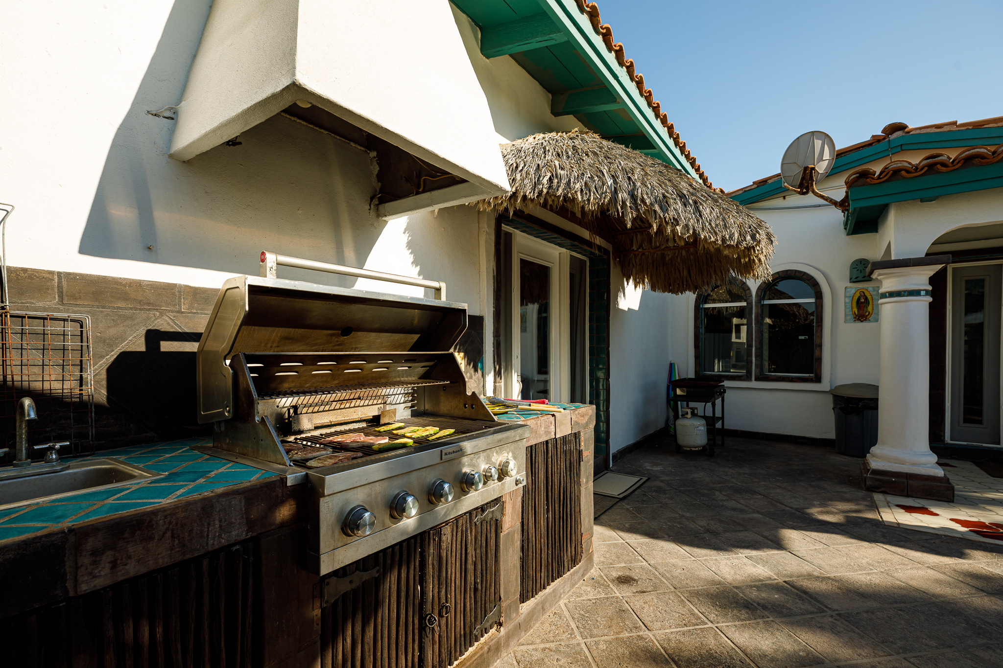 Grill/BBQ table outside Sunrise House