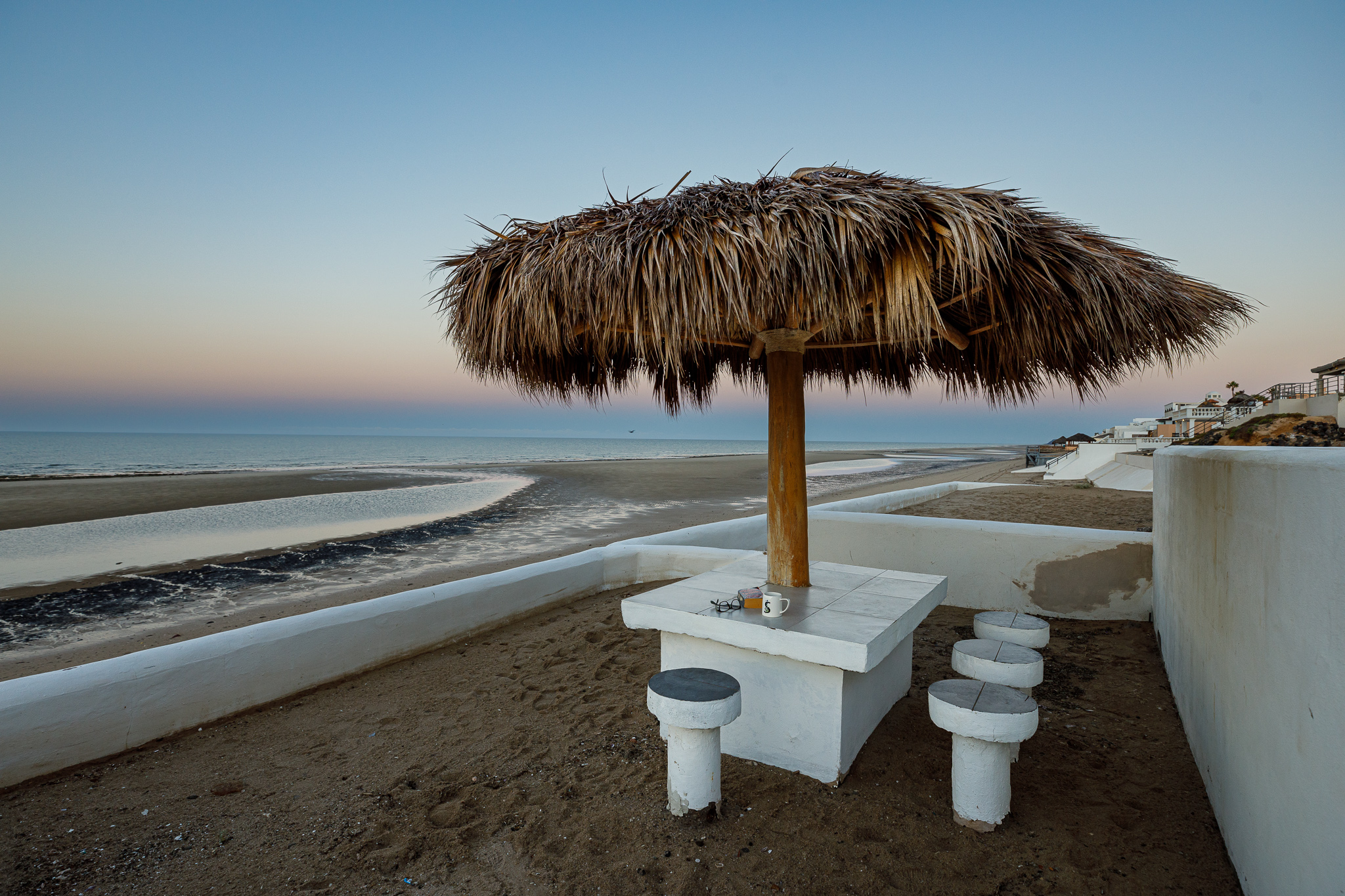 Palapa by the ocean and outdoor shower